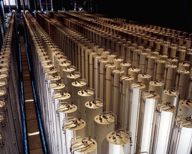 Cascades of gas centrifuges are used to enrich uranium ore to concentrate its fissionable isotopes.