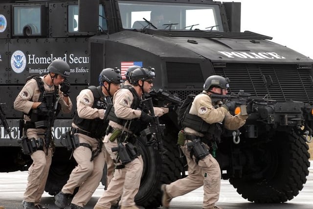 HSI Special Response Team (SRT) members training using armored vehicle at Fort Benning in Georgia.