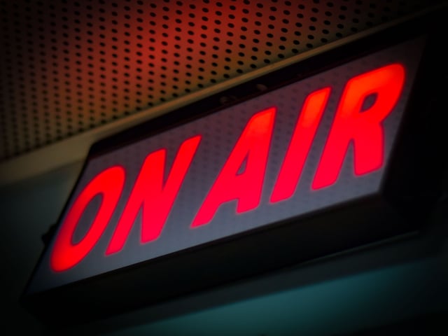 On Air sign illuminated usually in red while recording or broadcasting