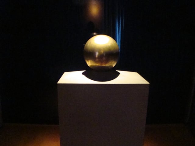 Gilded urn with Tesla's ashes, in his favorite geometrical object, a sphere (Nikola Tesla Museum, Belgrade)