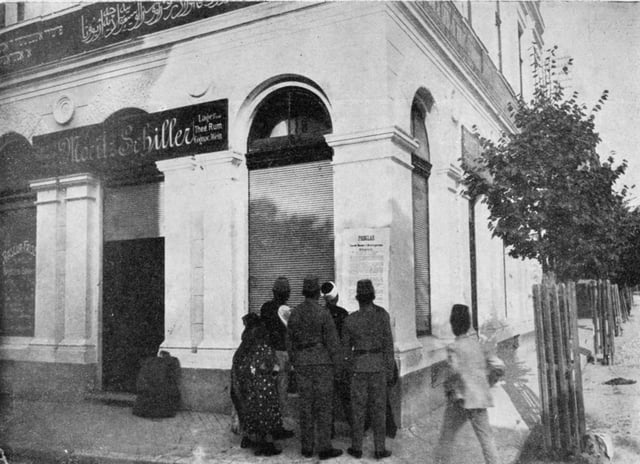 Sarajevo citizens reading a poster with the proclamation of the Austrian annexation in 1908