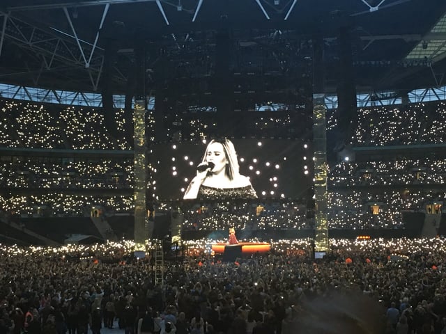 Adele at Wembley Stadium in June 2017. Adele's concert on 28 June was attended by 98,000 fans, a stadium record for a UK music event.