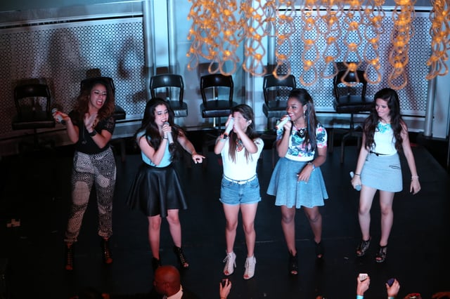 Fifth Harmony performing on the Harmonize America Mall Tour, August 2013.