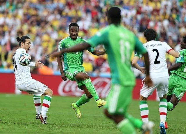 Mikel playing for Nigeria against Iran at the 2014 FIFA World Cup