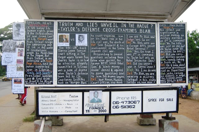 Newsboard documenting the Charles Taylor case