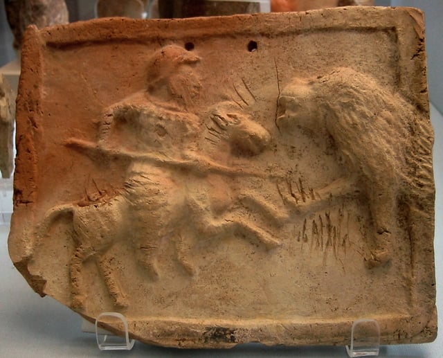 Parthian cataphract fighting a lion