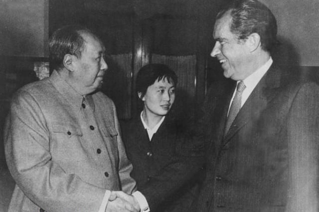 Mao greets U.S. President Richard Nixon during his visit to China in 1972.