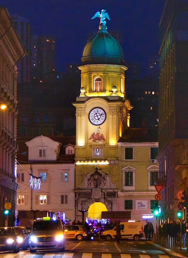 The Baroque city clock tower above the arched gateway linking the Korzo to the inner city, designed by Filbert Bazarig in 1876
