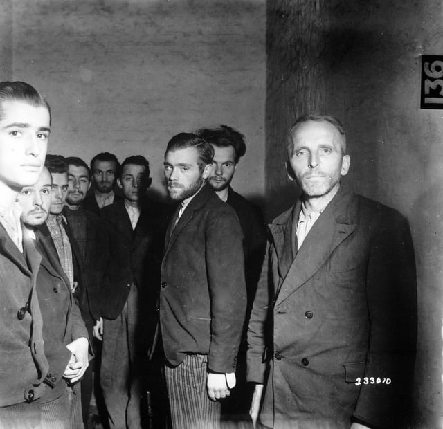 German Gestapo agents arrested after the liberation of Liège, Belgium, are herded together in a cell at the Citadel of Liège, October 1944