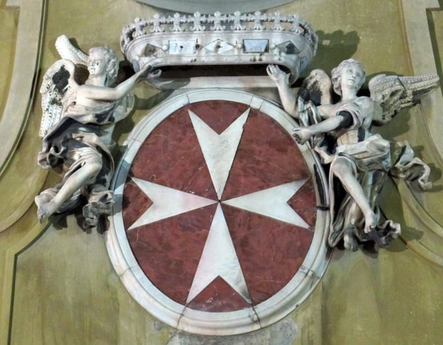 Coat of arms of the Knights of Malta from the façade of the church of San Giovannino dei Cavalieri, Florence, Italy