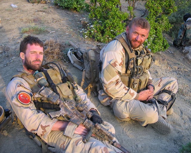 Navy SEALs LT Michael P. Murphy and STG2 Matthew Axelson in Afghanistan, both of whom were killed in action