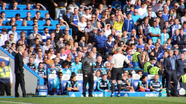 Wenger and Mourinho during a match between their teams in 2014