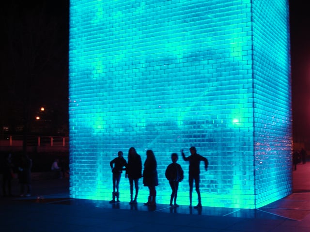 Tourists often interact with the fountain by silhouetting themselves against the fountain's lighting at night.