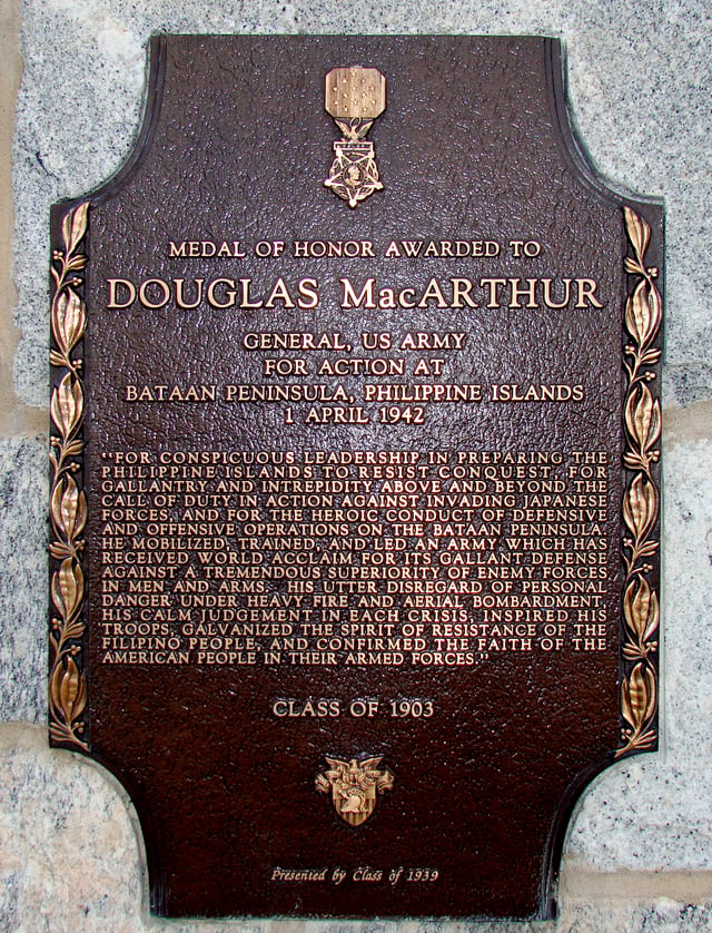 A plaque inscribed with MacArthur's Medal of Honor citation lies affixed to MacArthur barracks at the U.S. Military Academy