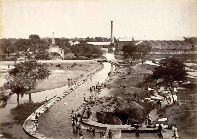 A mill with a canal connecting to Hussain Sagar lake. Following the introduction of railways in the 1880s, factories were built around the lake.