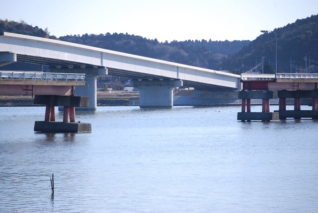 A highway bridge damaged and severed