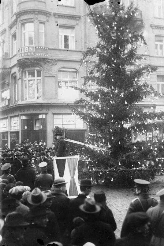 An early example of a public Christmas celebration tree for the unemployed in Prague