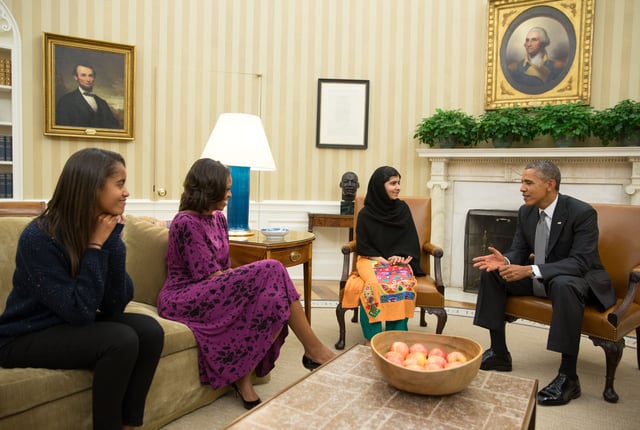 Malala Yousafzai, Pakistani schoolgirl with U.S. President Barack Obama and family. She won the 2014 Nobel Peace Prize.