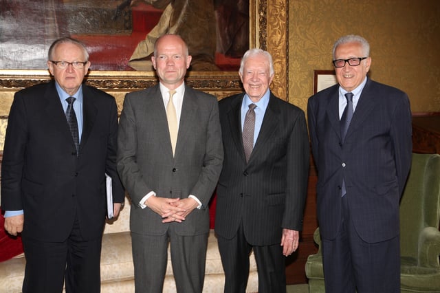 Carter (third from left) with William Hague, Martti Ahtisaari, and Lakhdar Brahimi from The Elders group in London, July 24, 2013.