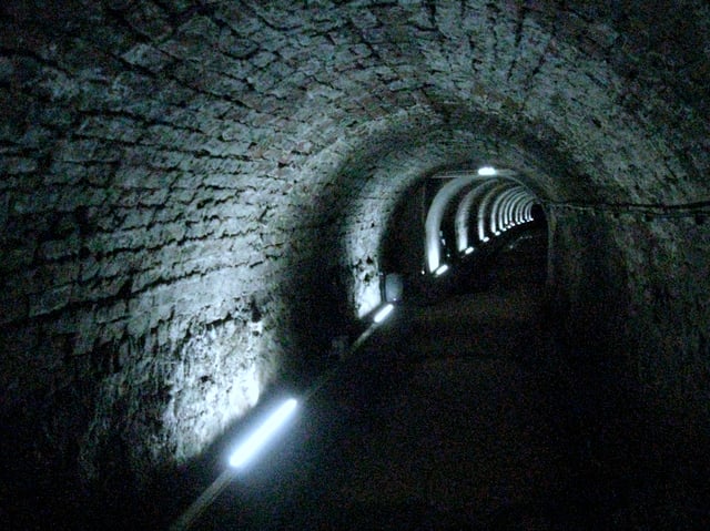 Victoria Tunnel, built 1842. In 1935 after a government document requested its cities build air-raid shelters, part of the tunnel was converted.