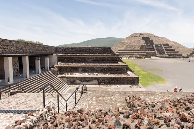 View of the Pyramid of the Moon and entrance to the Quetzalpapálotl Palace. During its peak in the Classic era, Teotihuacán dominated the Valley of Mexico and exerted political and cultural influence in other areas, such as in the Petén Basin.