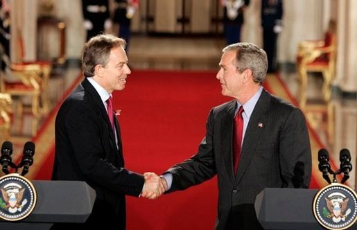 Tony Blair and George W. Bush shake hands after their press conference in the East Room of the White House on 12 November 2004.