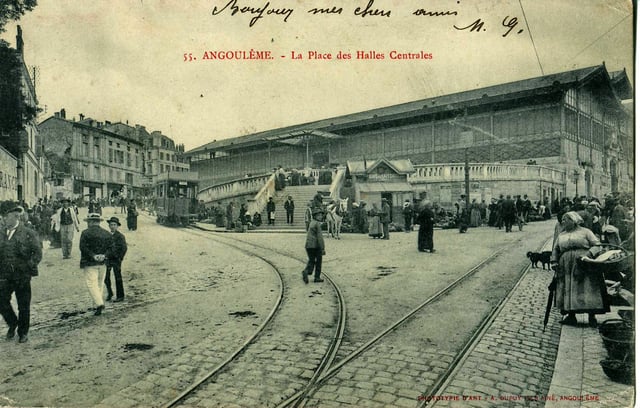 The network of Tramway of Angoulême served the city from 1900 to 1935.Seen here is a carriage at the Place des Halles before the First World War.