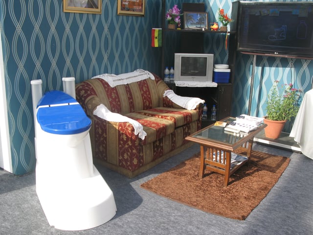 Example for technology innovation: The off-grid Nano Membrane Toilet of Cranfield University - prototype on display at Reinvent the Toilet Fair in Delhi, India