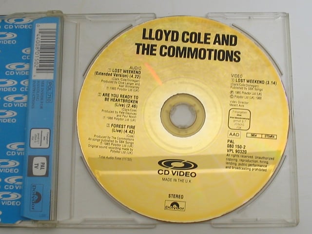 A compact disc within an open jewel case