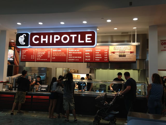 A Chipotle restaurant in Brandon, Florida, having the typical service-line layout with menu above