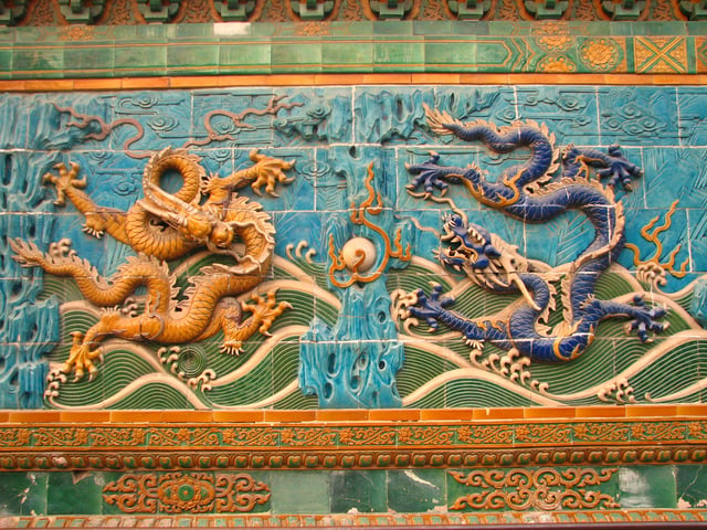 Carved imperial Chinese dragons at Nine-Dragon Wall, Beihai Park, Beijing
