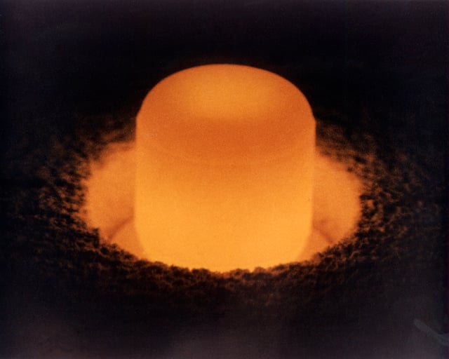 A glowing cylinder of 238PuO2