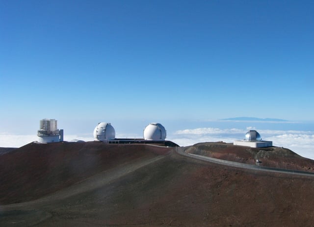 The Subaru Telescope (left) and Keck Observatory (center) on Mauna Kea, both examples of an observatory that operates at near-infrared and visible wavelengths. The NASA Infrared Telescope Facility (right) is an example of a telescope that operates only at near-infrared wavelengths.