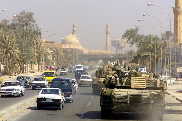 A Marine Corps M1 Abrams tank patrols Baghdad after its fall during Operation Iraqi Freedom in 2003.