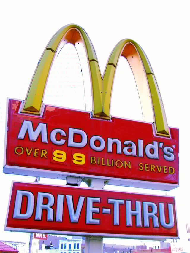 By 1993, McDonald's had sold more than 100 billion hamburgers. The once widespread restaurant signs that boasted the number of sales, such as this one in Harlem, were left at "99 billion" because there was space for only two digits.
