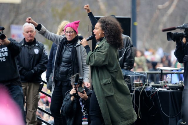 Keys protesting at the Women's March in 2017.