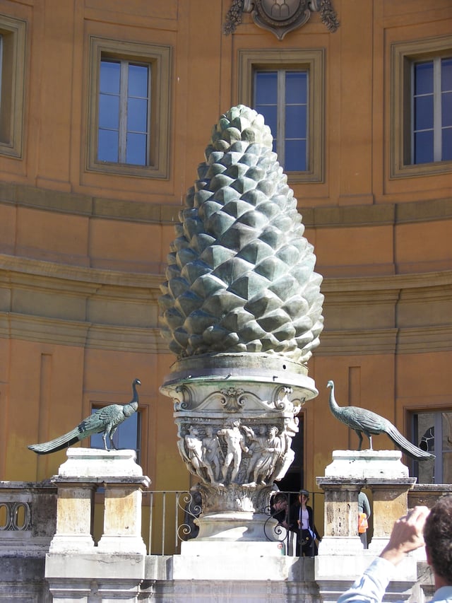 Fontana della Pigna (1st century AD) which stood in the courtyard of the Old St. Peter's Basilica during the Middle Ages and then moved again, in 1608, to a vast niche in the wall of the Vatican facing the Cortile della Pigna, located in Vatican City, in Rome, Italy.