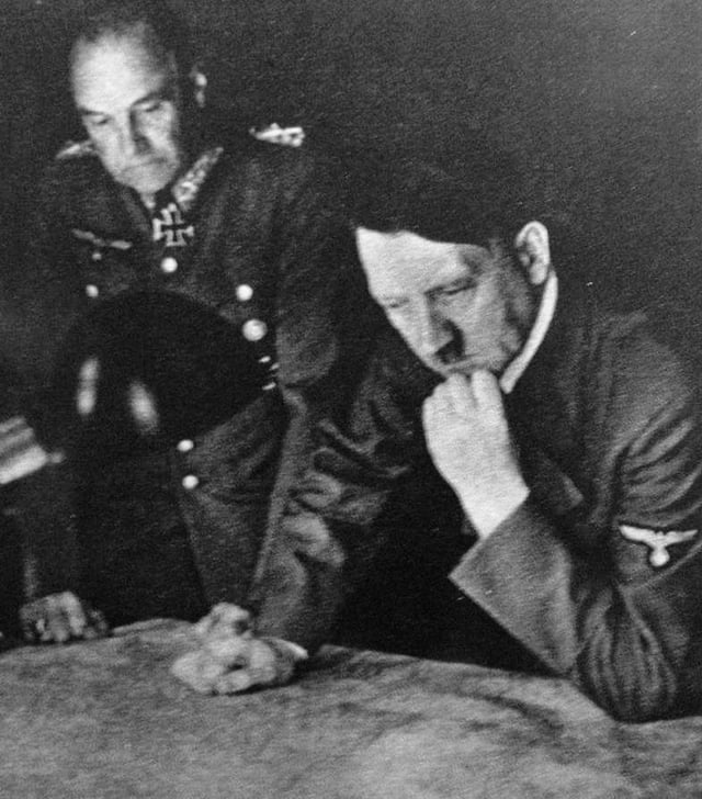 OKH commander Field Marshal Walther von Brauchitsch and Hitler study maps during the early days of Hitler's Russian Campaign