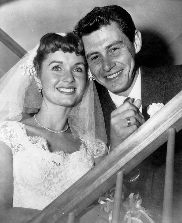 Reynolds and Eddie Fisher on their wedding day, 1955
