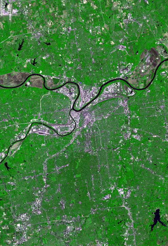 Kansas City satellite map. The larger Missouri River is zigzagging from west to east; the much smaller Kansas is approaching from the south and joins it at Kaw Point. Kansas City, Missouri, is located immediately south of their intersection; North Kansas City, Missouri, is to its northeast; and Kansas City, Kansas, is to the west.
