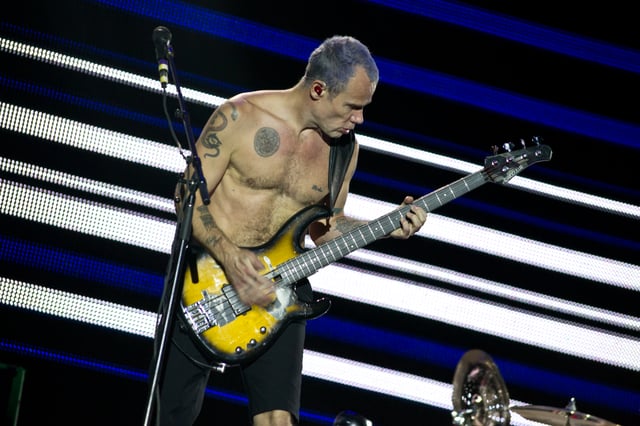 Flea performing with the Red Hot Chili Peppers at the 2012 Rock in Rio festival in Madrid