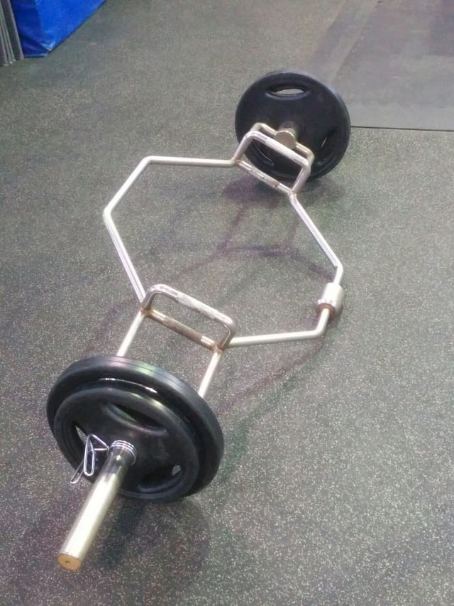 A loaded trap bar. Usually used for deadlifts and shrugs, it may also be used for trap bar jumps.