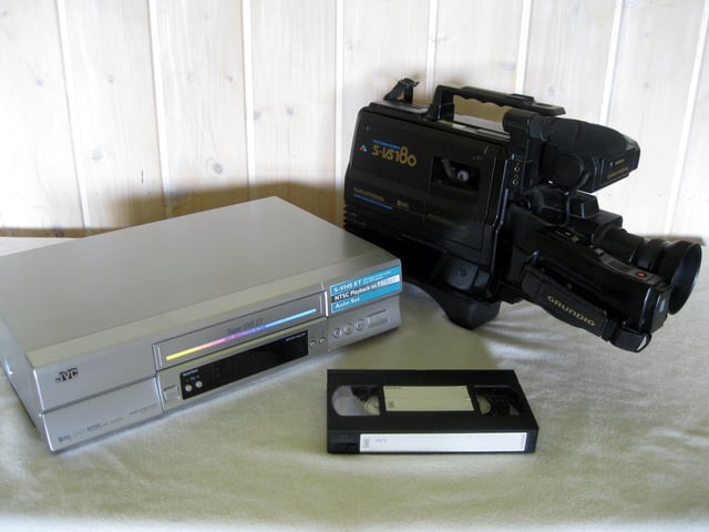 VHS recorder, camcorder and cassette.