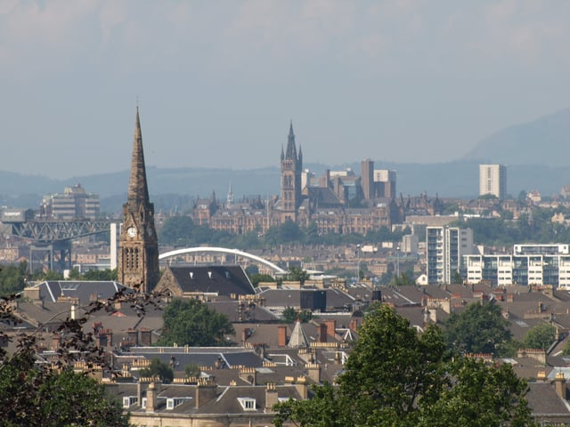 Panorama over Glasgow's South Side and West End from Queen's Park, looking north west. Left of centre can be seen the Clyde Arc bridge at Finnieston, while beyond is the tower of the University of Glasgow, with the Campsie Fells in the distance on the right.
