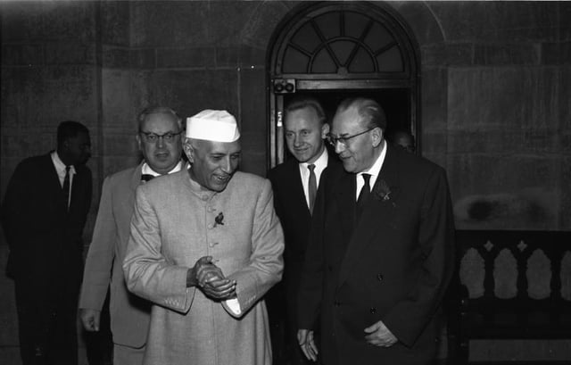 Indian Prime Minister Jawaharlal Nehru wearing mandarin collar suit and fez on a visit to East Germany, 1959.