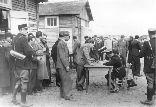 French Police registering new inmates at the Pithiviers camp.