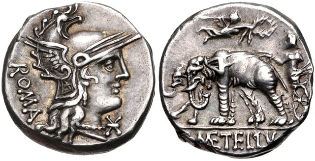 Denarius of C. Caecilius Metellus Caprarius, 125 BC. The reverse depicts the triumph of his great-grandfather Lucius, with the elephants he had captured at Panormos. The elephant had thence become the emblem of the powerful Caecilii Metelli.