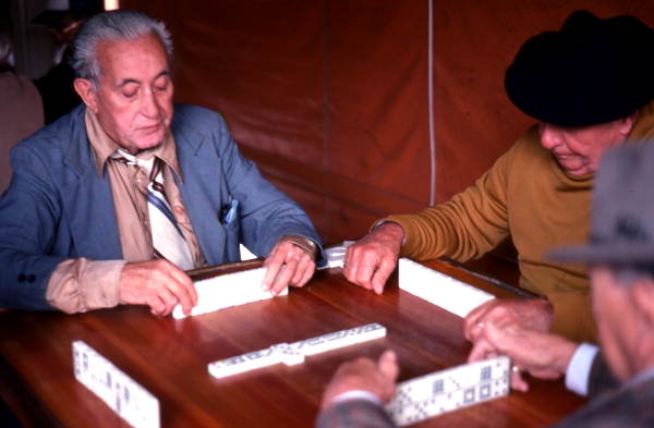 Cuban men playing dominoes in Miami's Little Havana. In 2010, Cubans made up 34.4% of Miami's population and 6.5% of Florida's.