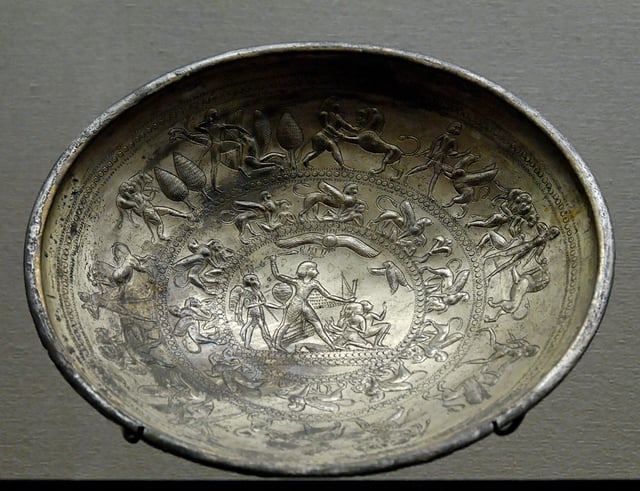 Bowl with mythological scenes, a sphinx frieze and the representation of a king vanquishing his enemies; Electrum, Cypro-Archaic I, 8th–7th centuries BC, from Idalion, Cyprus.