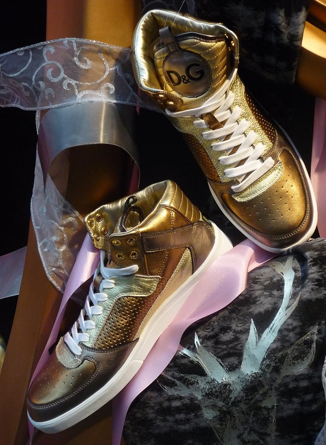 A pair of Dolce & Gabbana's Golden Sneakers.